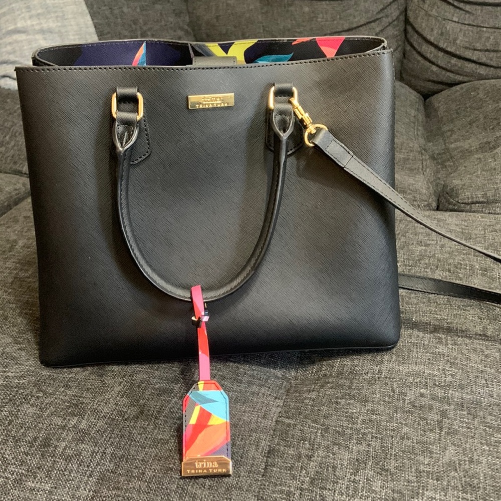 Black Trina Turk purse. Brand new used once. Super cute!